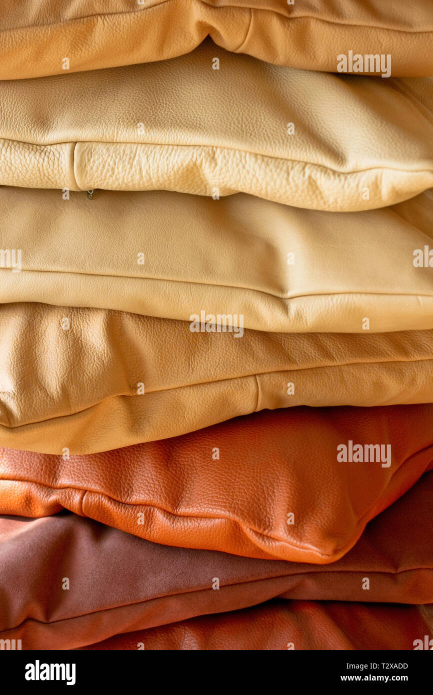Various decorative pillows made from real leather Stock Photo