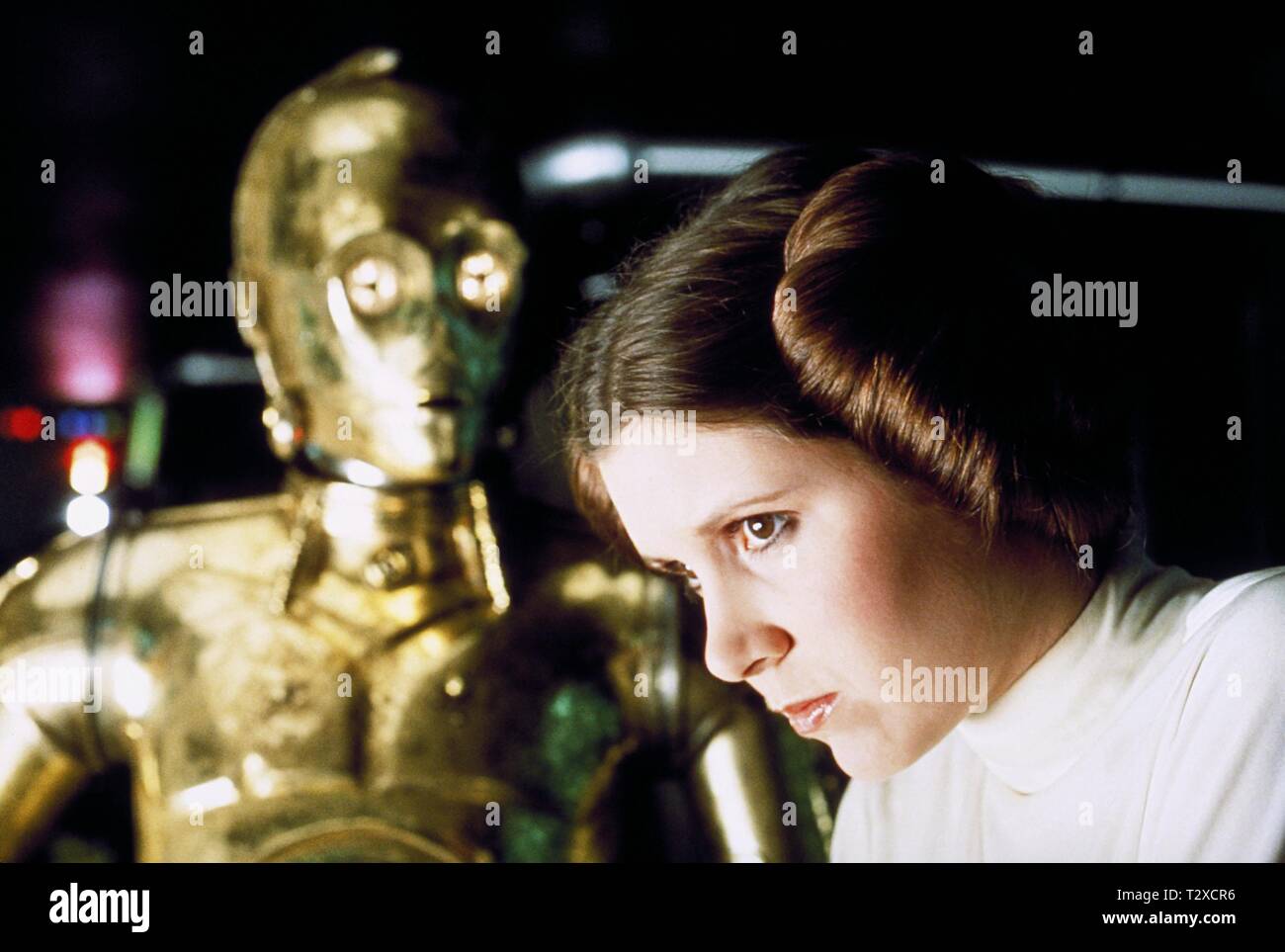 ANTHONY DANIELS, CARRIE FISHER, STAR WARS: EPISODE IV - A NEW HOPE, 1977 Stock Photo