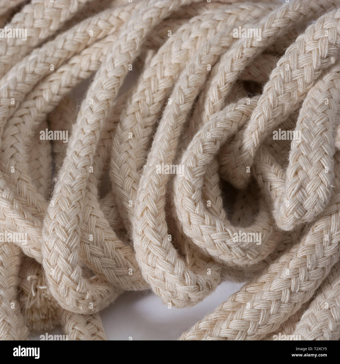 Macro close-up of unbleached diamond braided cotton spirit oil lamp wicks.  Metaphor intertwines, weaving Stock Photo - Alamy
