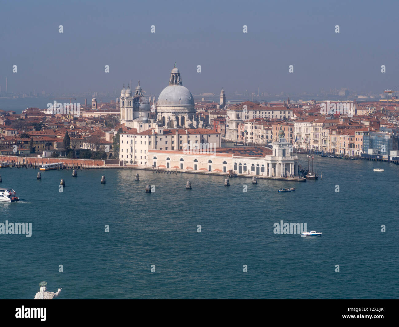View from Isola di San Giorio of entrance to Grand Canal, Venice, with the Centro d'Arte Contemporanea Punta della Dogana and Chiesa di Santa Maria Stock Photo