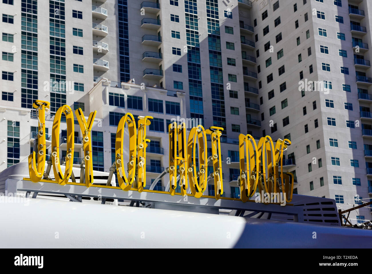 A restaurant neon sign that says, Joy of Hot Dog in downtown Las Vegas Stock Photo
