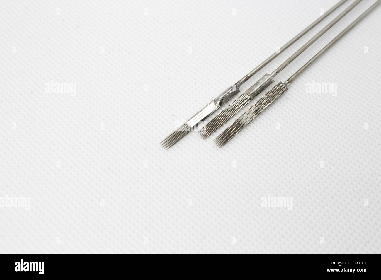 Tattoo needle, equipment, tattoo ink on white background Stock Photo