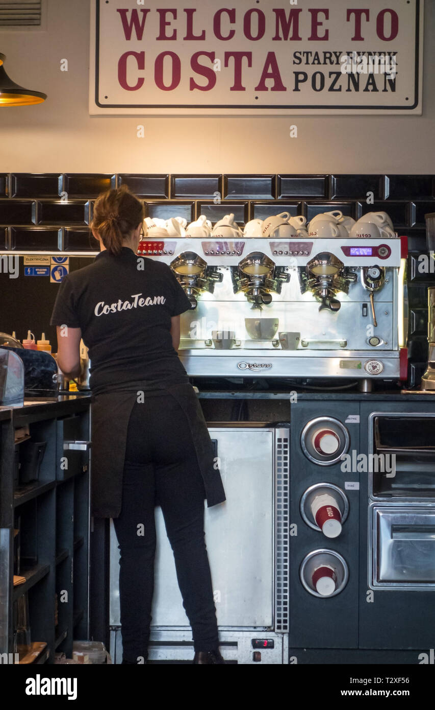 Barista making fresh coffee from a 