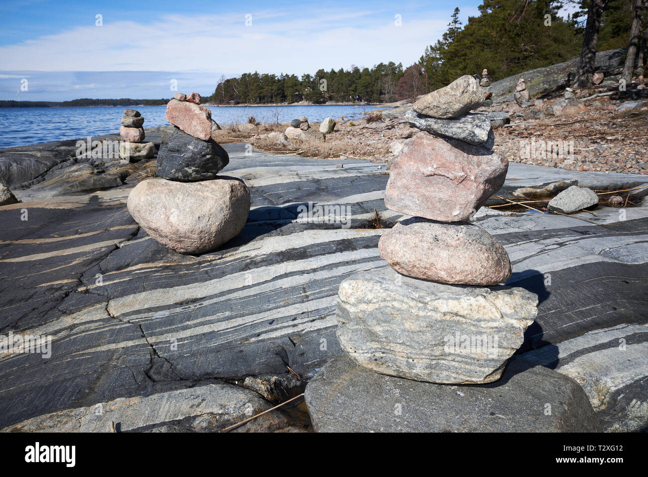 Peaceful summer landscape by the Baltic Sea in Kasnäs, Kemiö, Finland. Wide angle shot of the rocks on the seashore in the Finnish archipelago. Stock Photo