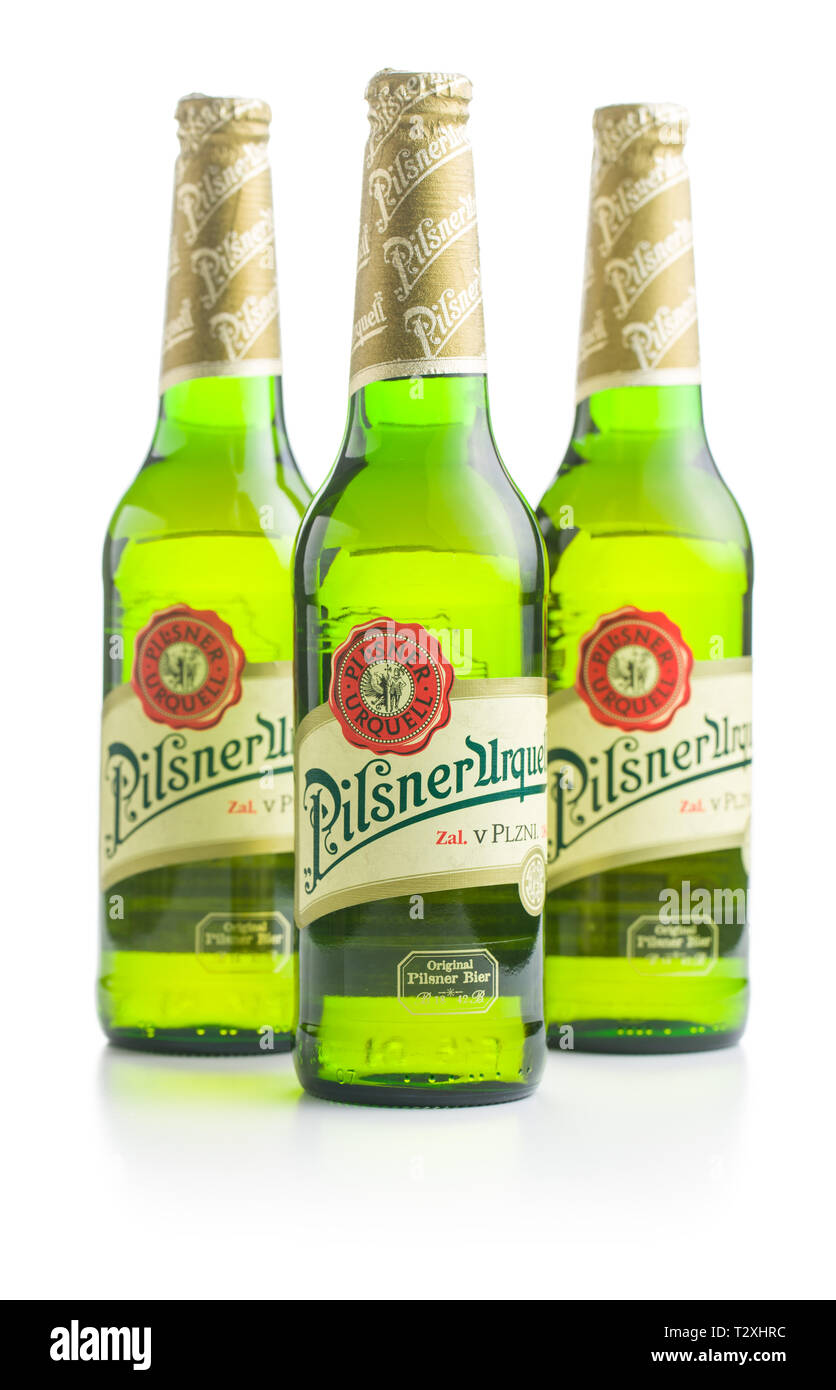 Pilsner Urquell lager beer bottle isolated on white background. Pilsner Urquell is a Czech beer. Stock Photo