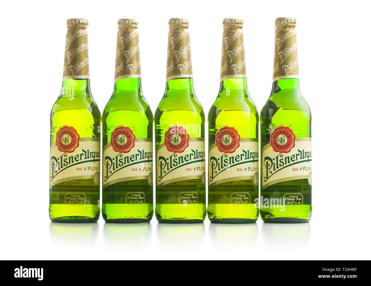 Pilsner Urquell lager beer bottle isolated on white background. Pilsner