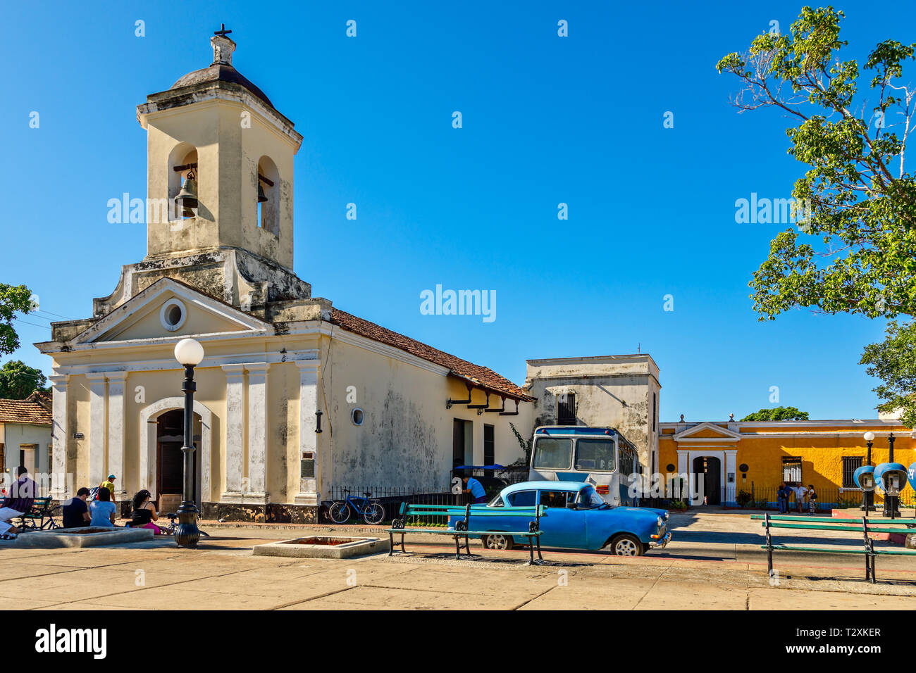 Center square of Cuban town with church Iglesia San Francisco de Paula, Trinidad, Cuba Stock Photo