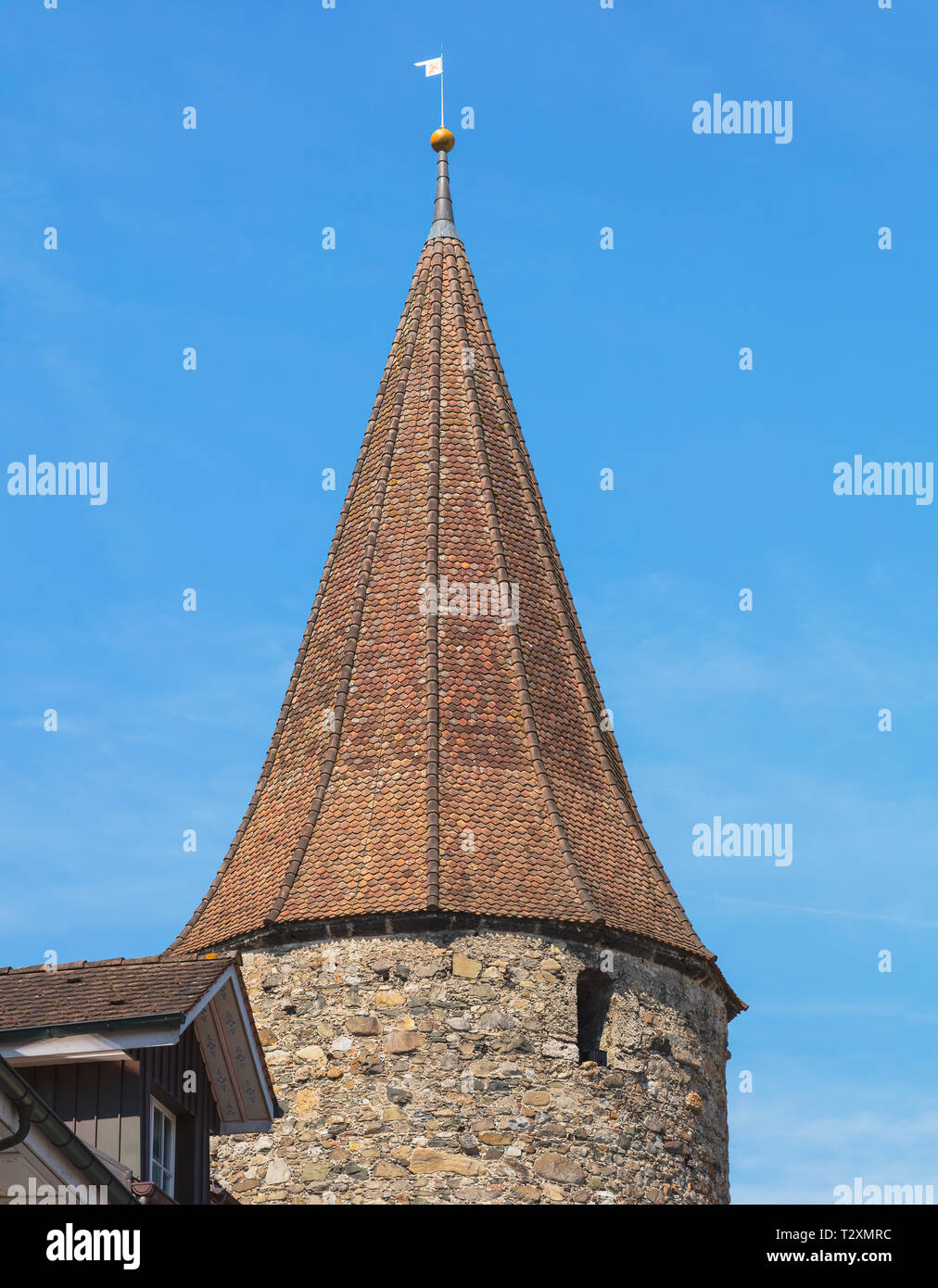 Upper part of a medieval tower in the historic part of the town of Bremgarten, Switzerland Stock Photo