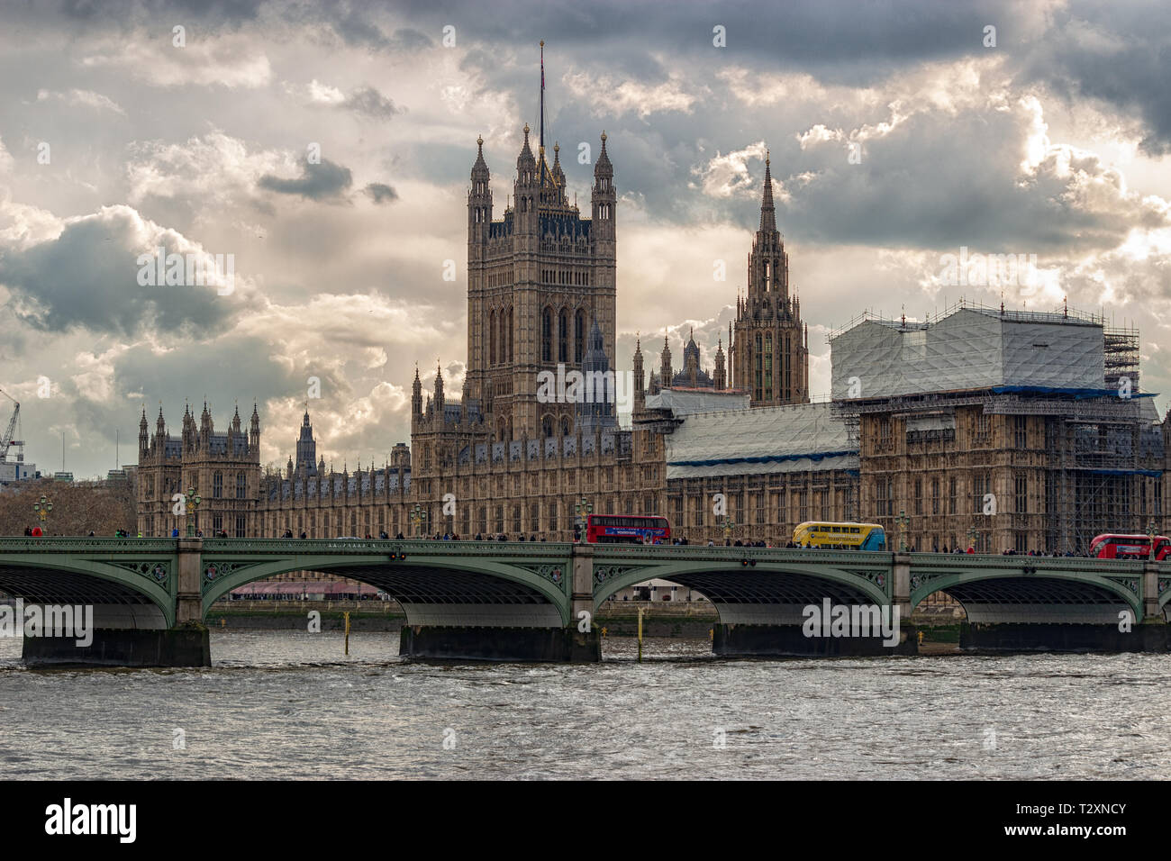 Houses Of Parliament, Westminster, London, England. April 3 2019. The famous historic building shot from the South Bank across the River Thames under Stock Photo