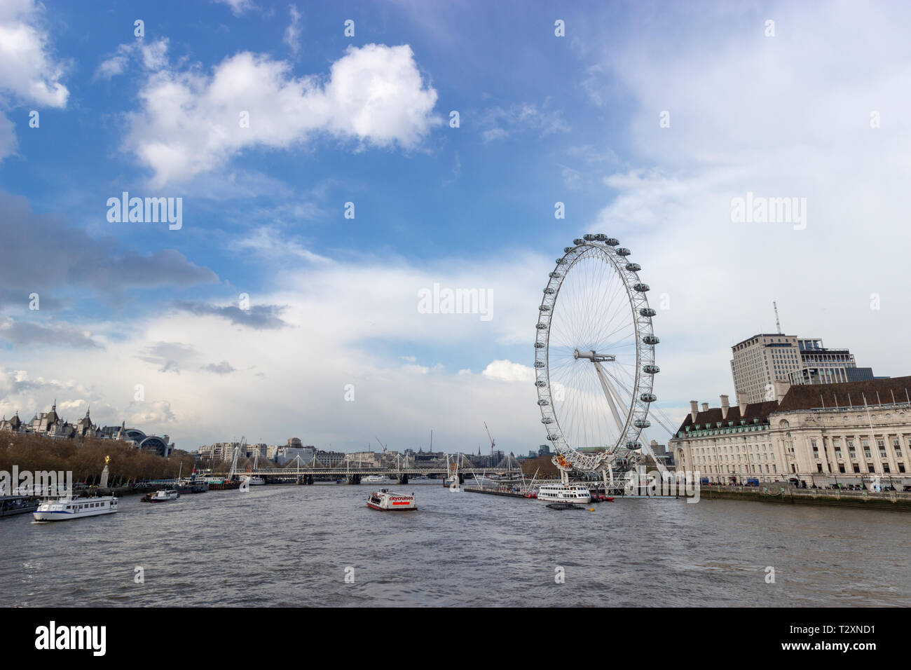 The London Eye, South Bank, London, England, April 3 2019. A view across the Thames of the famous London attraction Stock Photo
