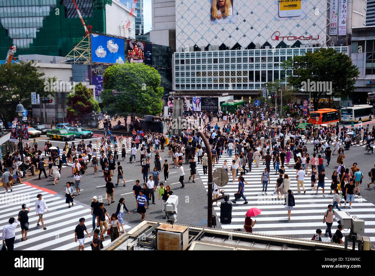 Pictures are pedestrians crossing Shibuya Crossing Tokyo Japan Stock Photo