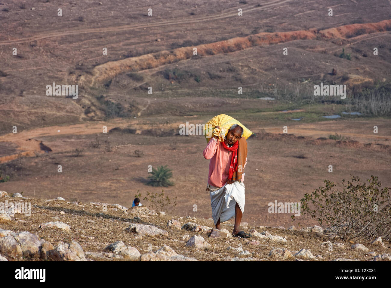 Indian man carrying sack hi-res stock photography and images - Alamy