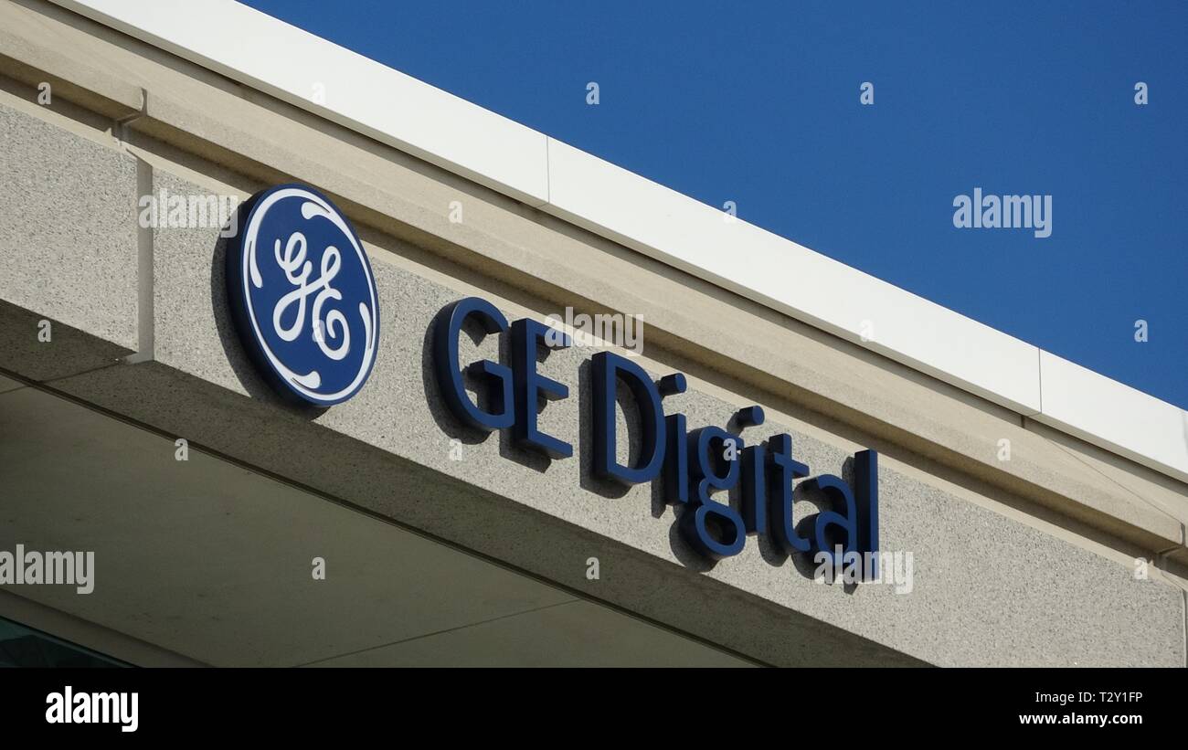 Closeup of sign with logo for General Electric division GE Digital at