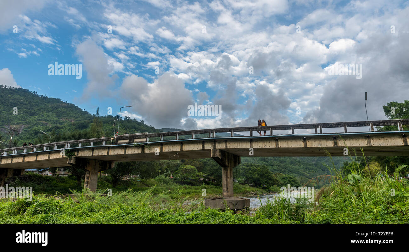 Two women standing on bridge hi-res stock photography and images - Alamy