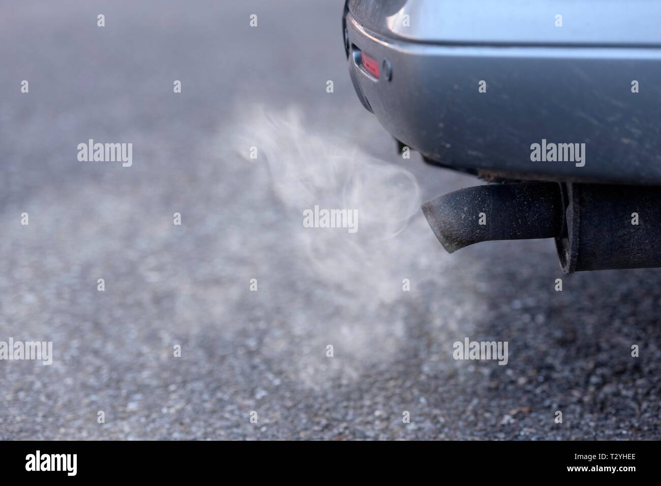 Exhaust pipe of a passenger car with exhaust gases, diesel engine