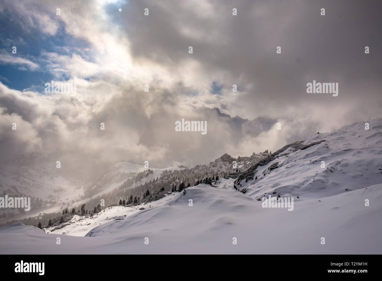 Clouds carrying snow in the italian alps Stock Photo - Alamy