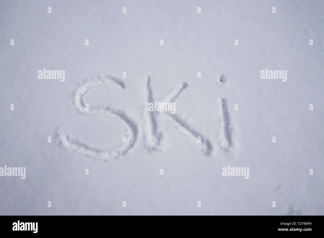 Ski word written in a cold snow background Stock Photo Alamy