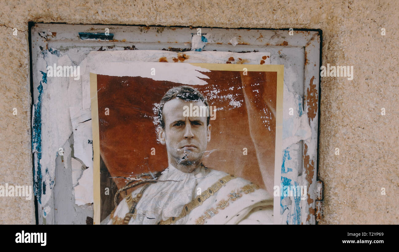 A political poster with the likeness of Emmanuel Macron, France's president, in Nice, France Stock Photo