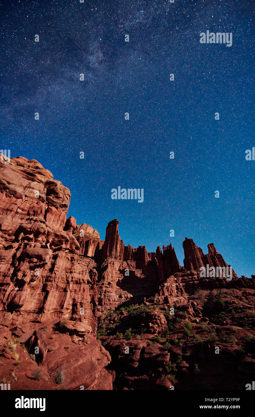 night sky and milky way above Fisher Towers, Moab, Utah, USA, North America Stock Photo