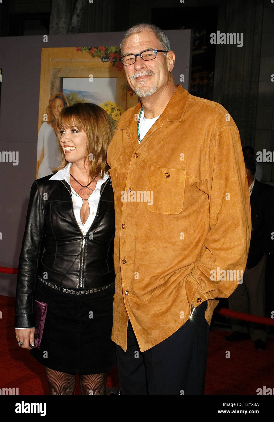 Phil Jackson & Jeanie Buss at the 'Under The Tuscan Sun' World Premiere at the El Capitan Theatre in Hollywood, CA. The event took place on Saturday, September 20, 2003.  Photo Credit: SBM / PictureLux  File Reference # 33790 482SBMPLX Stock Photo