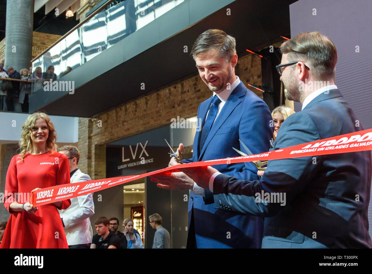 04.04.2019. RIGA, LATVIA.  Vytautas Labeckas CEO of Akropolis and Kaspars Beitins, CEO of SIA AKROPOLE RIGA  with red lente, during Akropole shopping  Stock Photo