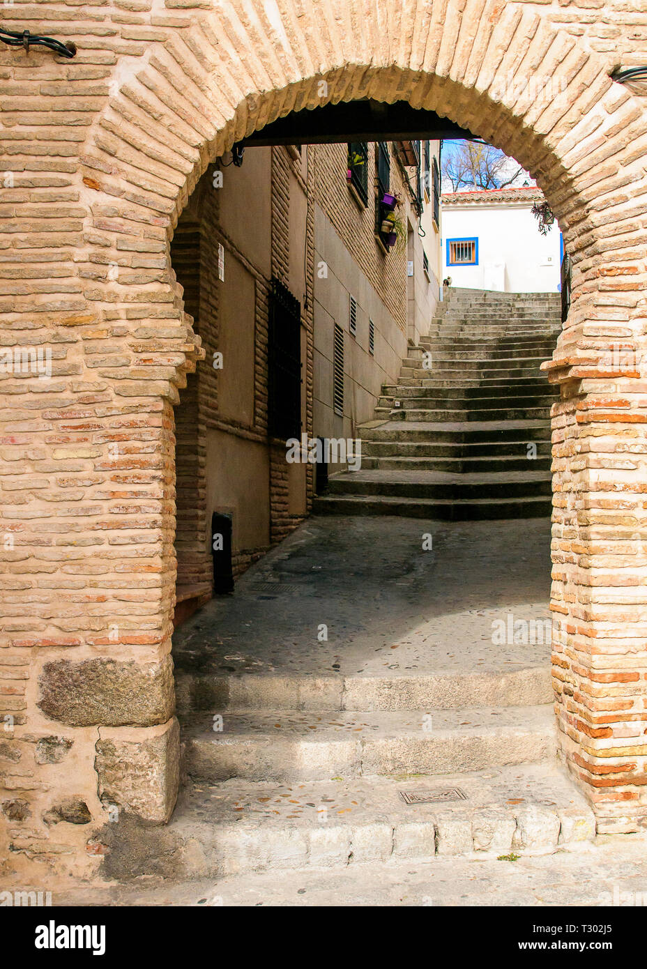 Arab style arch in brick wall Stock Photo Alamy