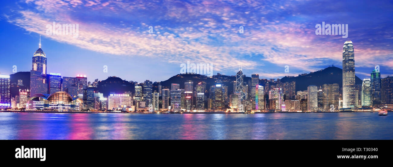 Panoramic view of Hong Kong skyline at dusk Stock Photo