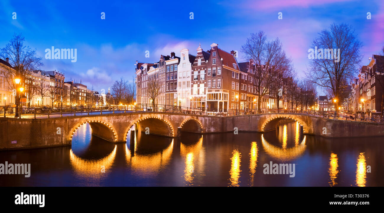 Panoramic view of Keizersgracht Canal at dusk Stock Photo