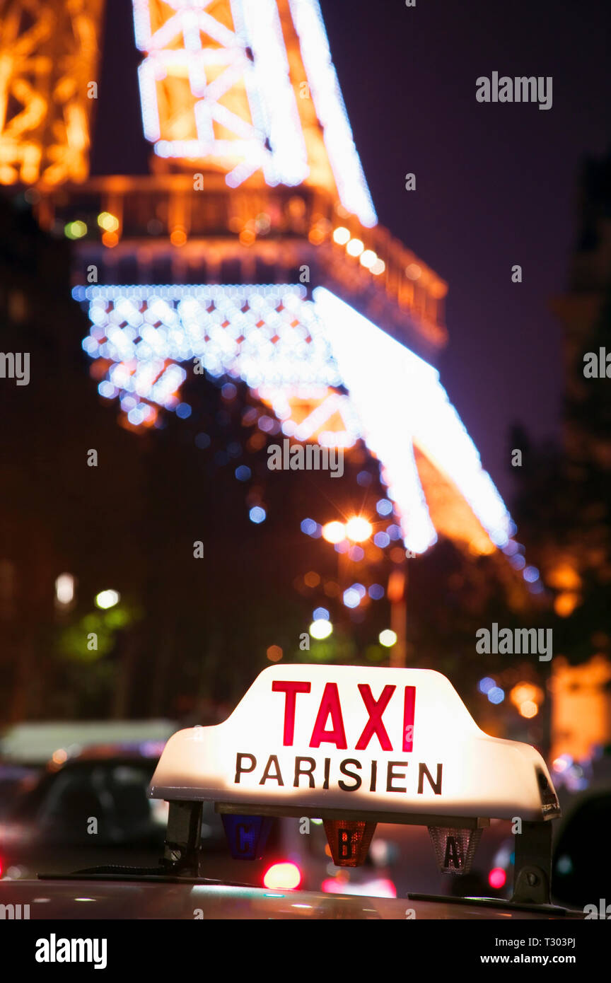 Taxi cab sign and Eiffel Tower, Paris, France. Stock Photo