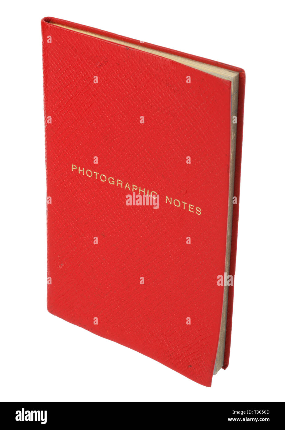 Small notebook to log photographic details such as film type, shutter speed and aperture, frame by frame. Stock Photo