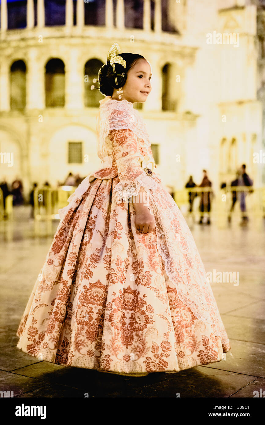 Portrait of a latina fallera girl wearing the traditional valencian costume  of Fallas Stock Photo - Alamy