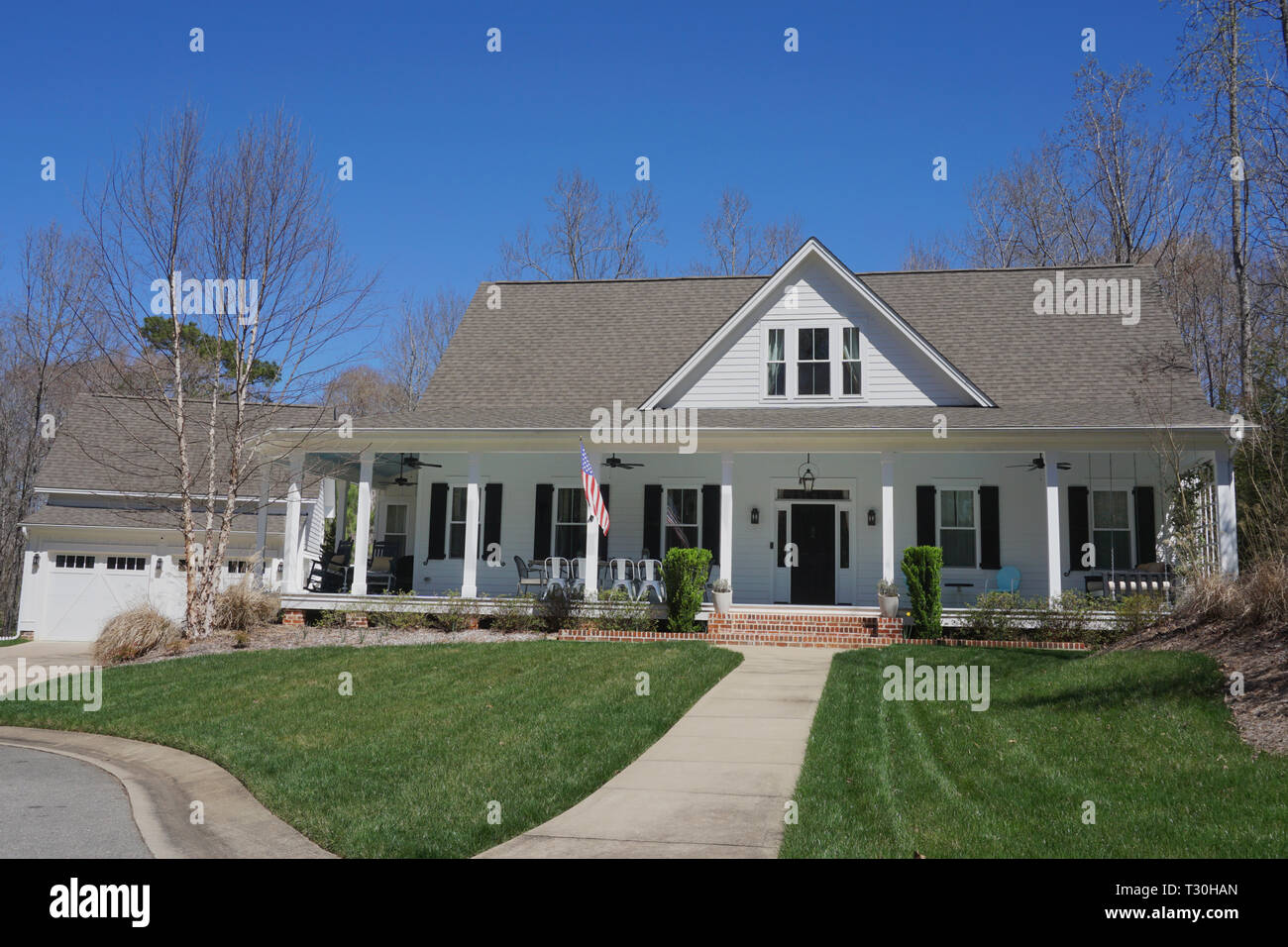 Suburban home with a large porch Stock Photo