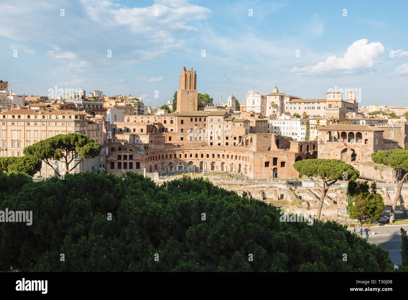 Panoramic view of city Rome with Trajan's Market (Mercati di Traiano) and Roman forum from Vittorio Emanuele II Monument also known as the Vittoriano. Stock Photo