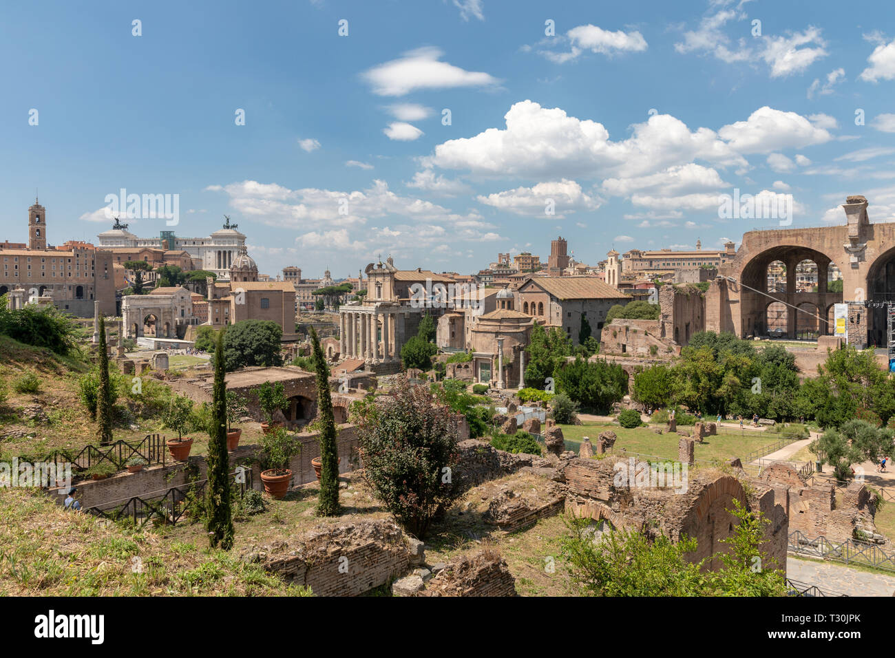 Panoramic view of Roman forum, also known by Forum Romanum or Foro Romano from Palatine Hill. It is a forum surrounded by ruins of ancient government  Stock Photo