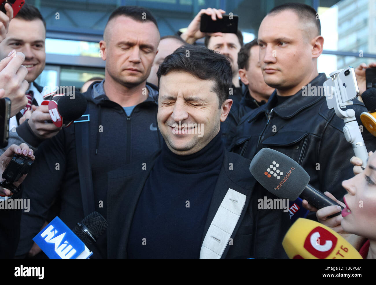 Kiev, Kiev, Ukraine. 5th Apr, 2019. Ukrainian presidential candidate Volodymyr Zelensky seen talking to the media during his visit to the medical center for a test.On April 3, 2019 presidential candidate Volodymyr Zelenskiy declared his readiness to go to the debate before the second round of presidential elections with Ukrainian President and presidential candidate Petro Poroshenko, however, he voiced a number of conditions, in particular, the debate should be held at the Olympiyskiy stadium in Kiev, and candidates must pass a test for alcohol and drugs. Ukrainian President Petro Poroshenk Stock Photo