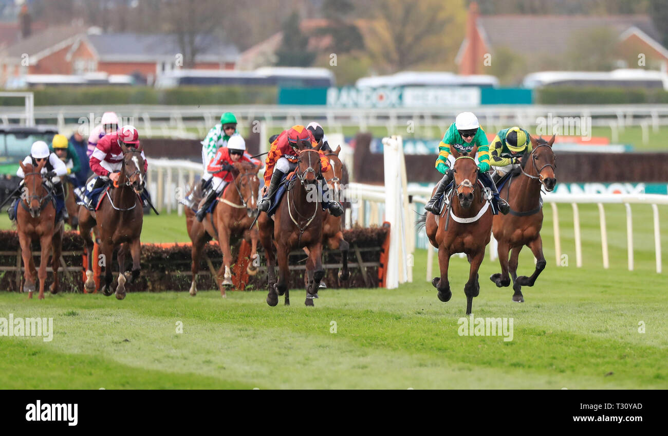 Aintree Racecourse, Aintree, UK. 5th Apr, 2019. The 2019 Grand National horse racing festival, day 2; Champ (white cap) ridden by Barry Geraghty runs on to win The Doom Bar Sefton Novices Hurdle Credit: Action Plus Sports/Alamy Live News Stock Photo