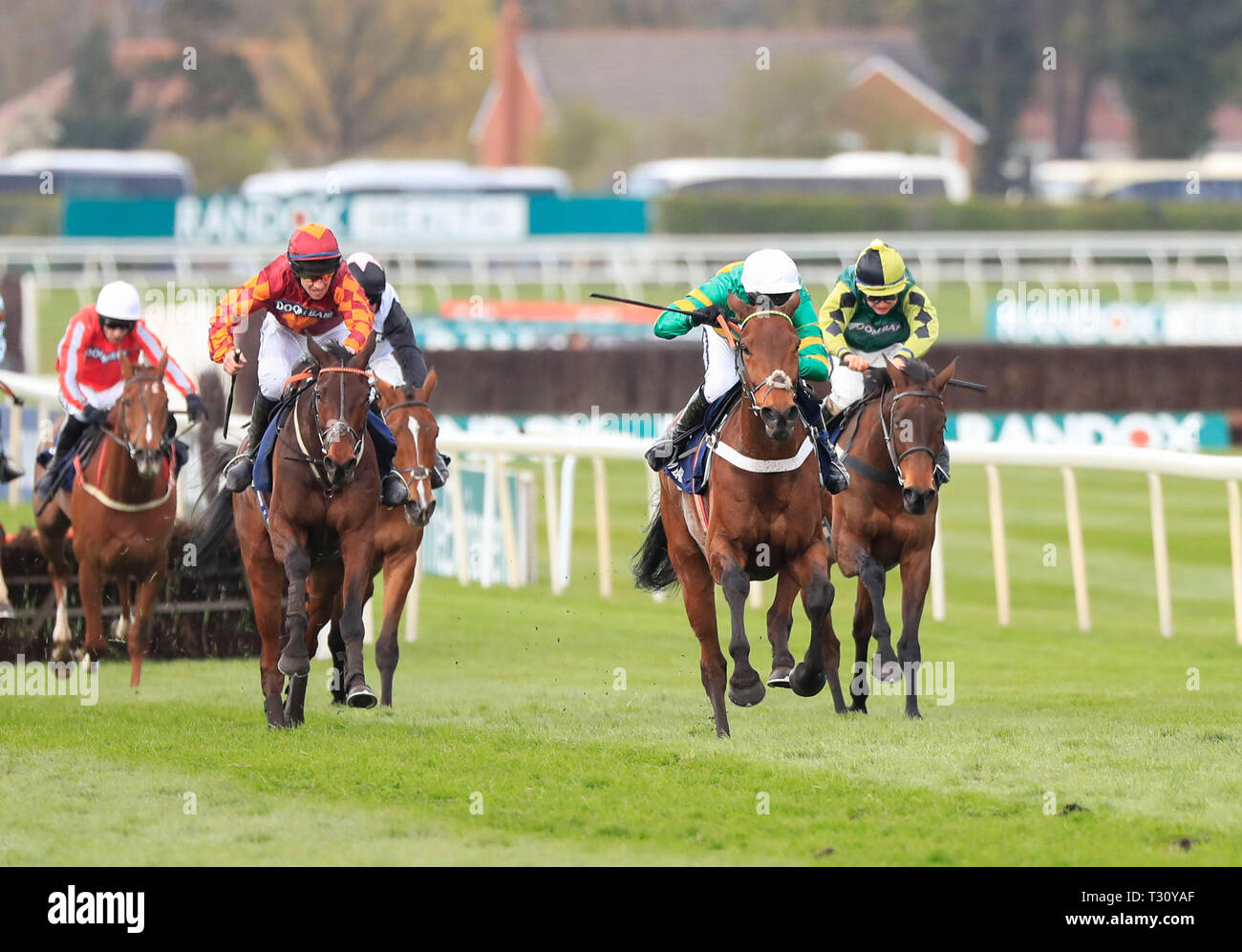 Aintree Racecourse, Aintree, UK. 5th Apr, 2019. The 2019 Grand National horse racing festival, day 2; Champ (white cap) ridden by Barry Geraghty runs on to win The Doom Bar Sefton Novices Hurdle Credit: Action Plus Sports/Alamy Live News Stock Photo