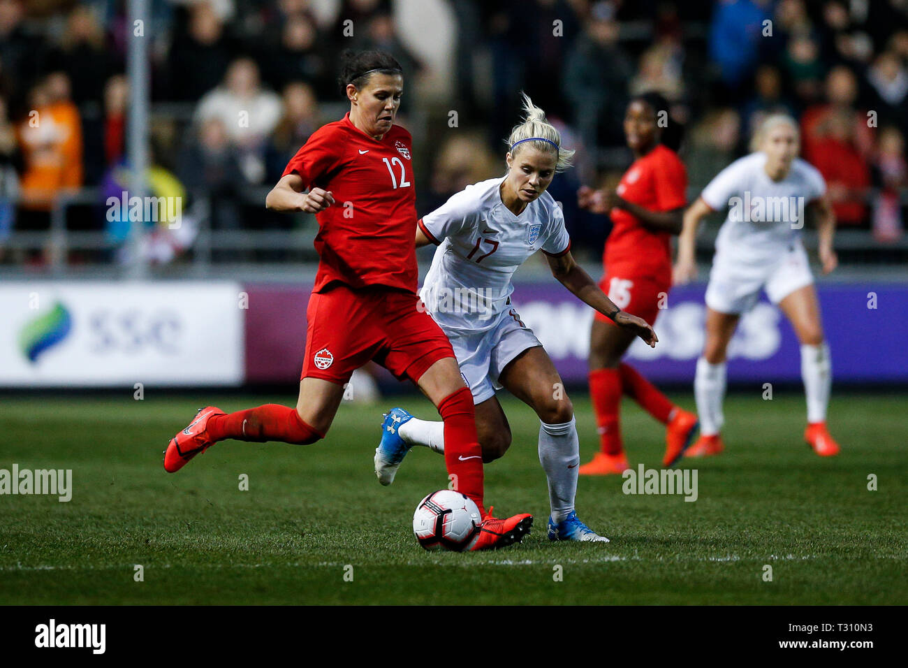Manchester, UK. 05th Apr, 2019. Christine Sinclair of Canada and Rachel Daly of England during the International Friendly match between England Women and Canada Women at Academy Stadium on April 5th 2019 in Manchester, England. (Photo by Daniel Chesterton/phcimages.com) Credit: PHC Images/Alamy Live News Stock Photo