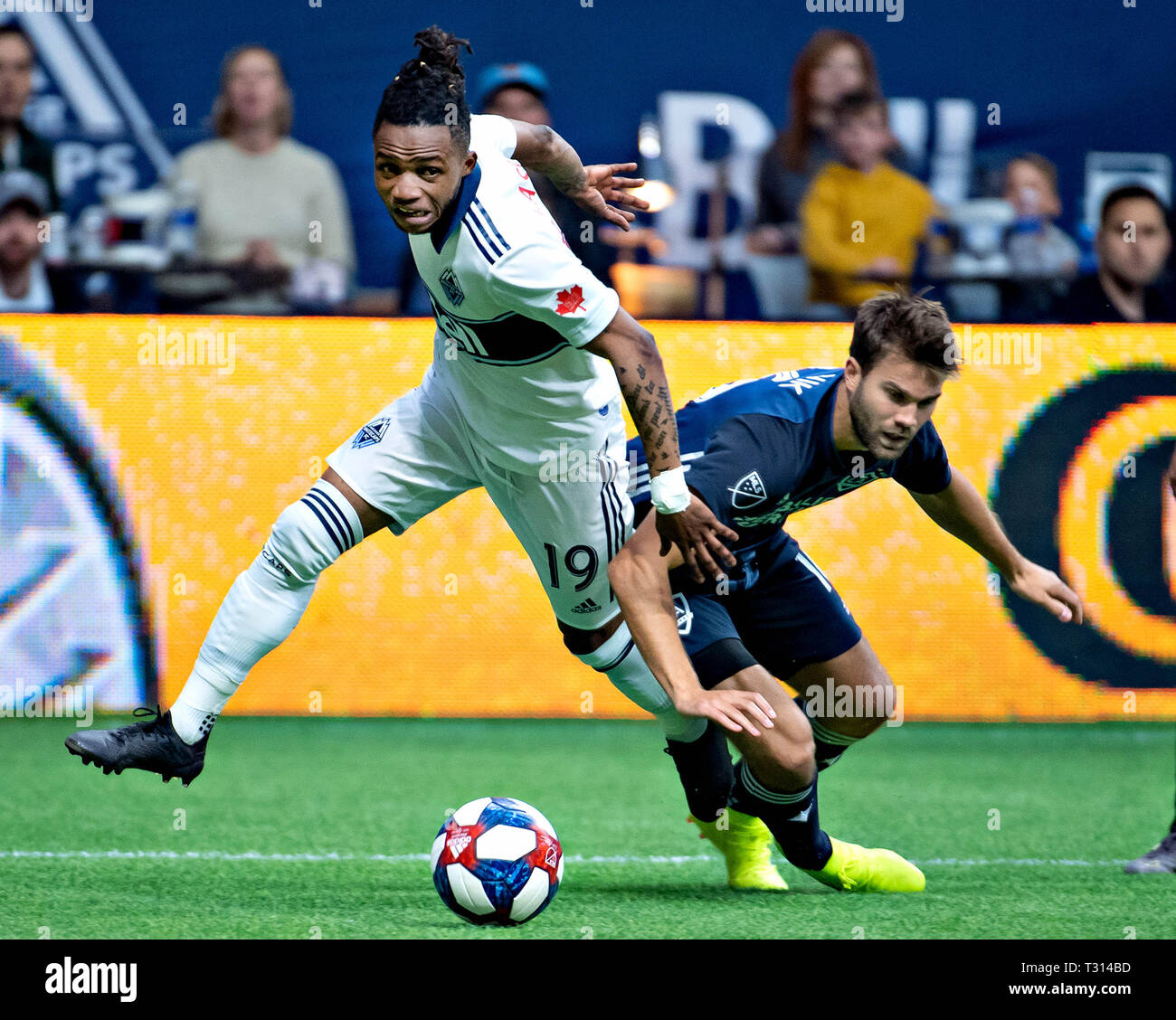 Vancouver, Canada. 5th Apr, 2019. LA Galaxy's Jorgen Skjelvik (R) vies with Vancouver Whitecaps' Lass Bangoura during an MLS soccer match between Vancouver Whitecaps and LA Galaxy at BC Place in Vancouver, Canada, April 5, 2019. LA Galaxy won 2-0. Credit: Andrew Soong/Xinhua/Alamy Live News Stock Photo