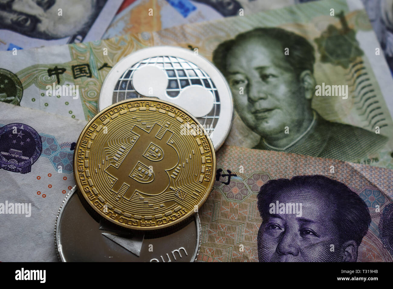 Ripple XRP Coin on Chinese Yuan and US dollar. Close-up Stock Photo - Alamy