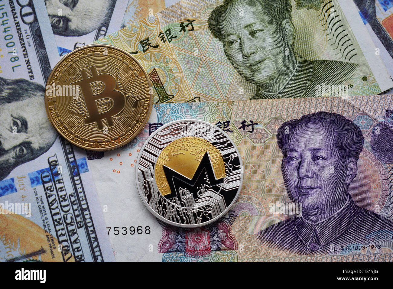 Bitcoin BTC and Monero XMR Coins on Chinese Yuan and US dollar banknotes.  Close-up Stock Photo - Alamy