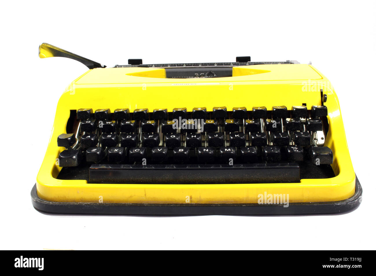 Retro Yellow Typewriter on a White Background Stock Photo - Alamy