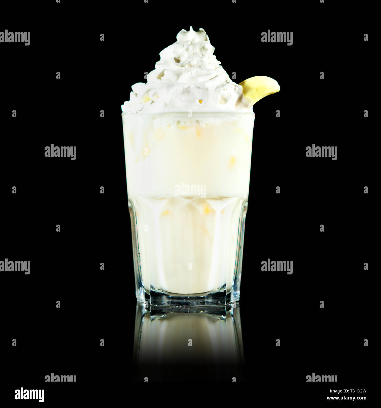 banana milkshake or cocktail on a black background Stock Photo