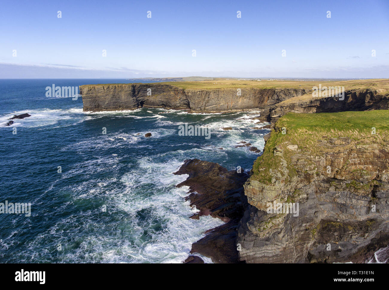 Aerial birds eye view Loop Head Peninsula landscape, along the wild Atlantic way in West Clare Ireland. peaceful roads and deserted beaches stretches. Stock Photo