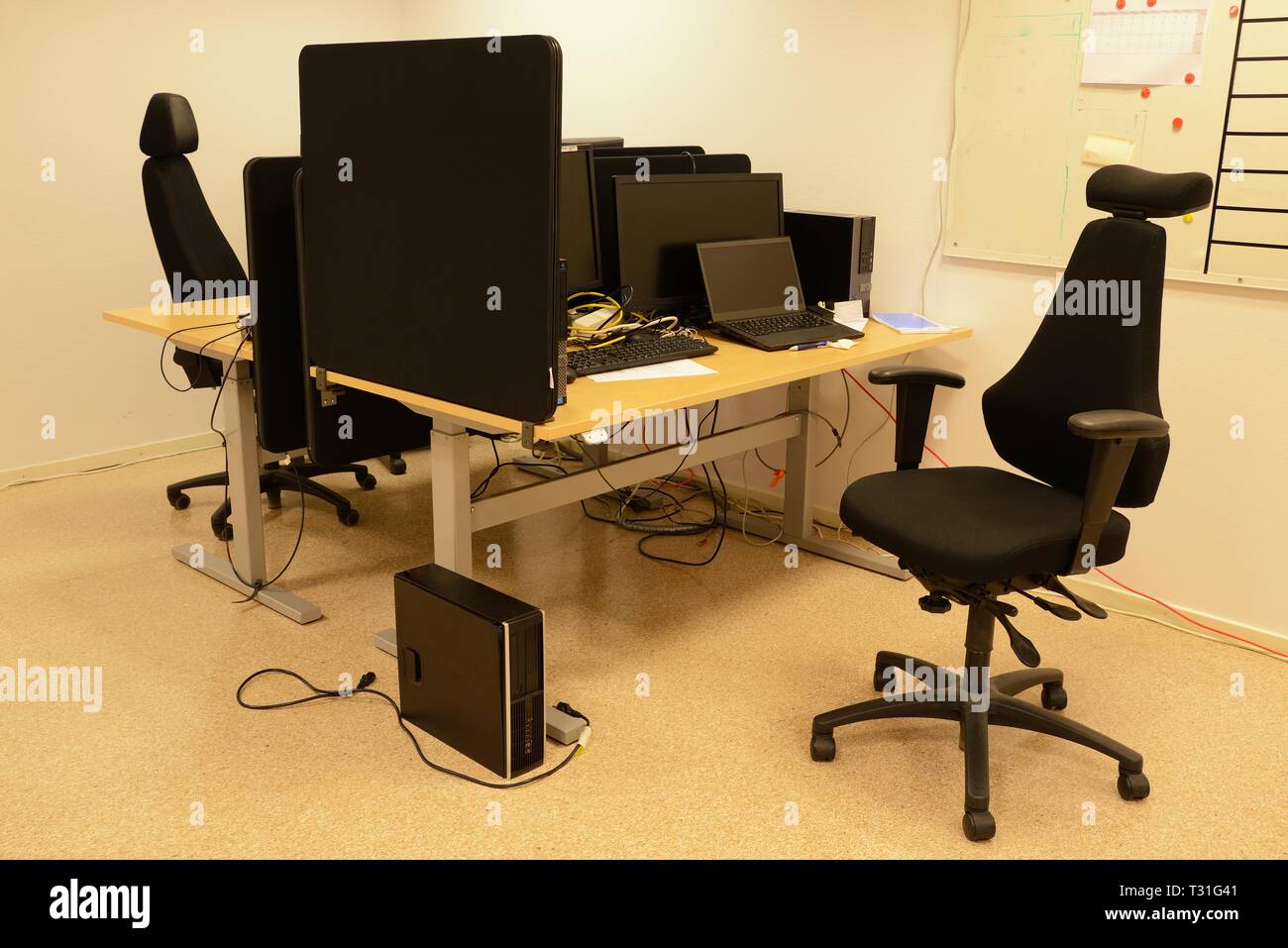 Empty office chairs in a row Stock Photo