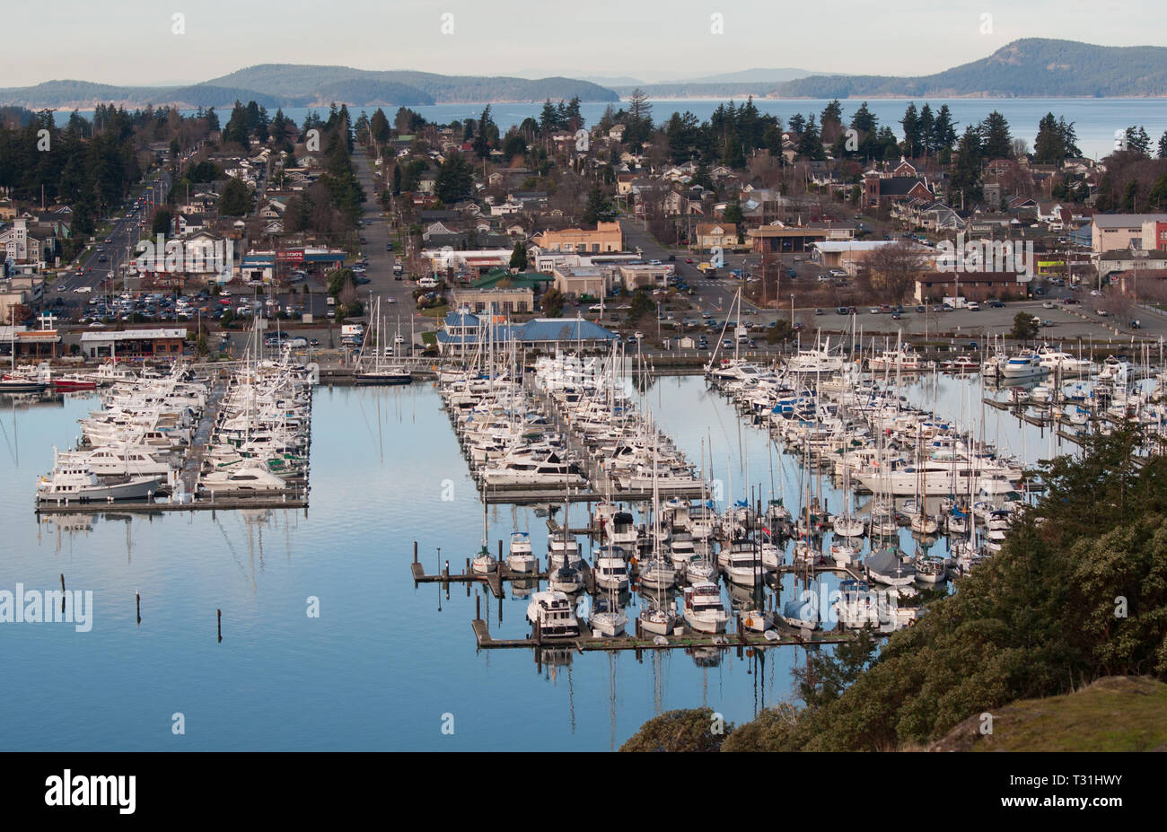 This is a landscape aerial view of the small town / city of Anacortes, Washington.  A popular town for tourist to travel to, a gateway to the San Juan Stock Photo