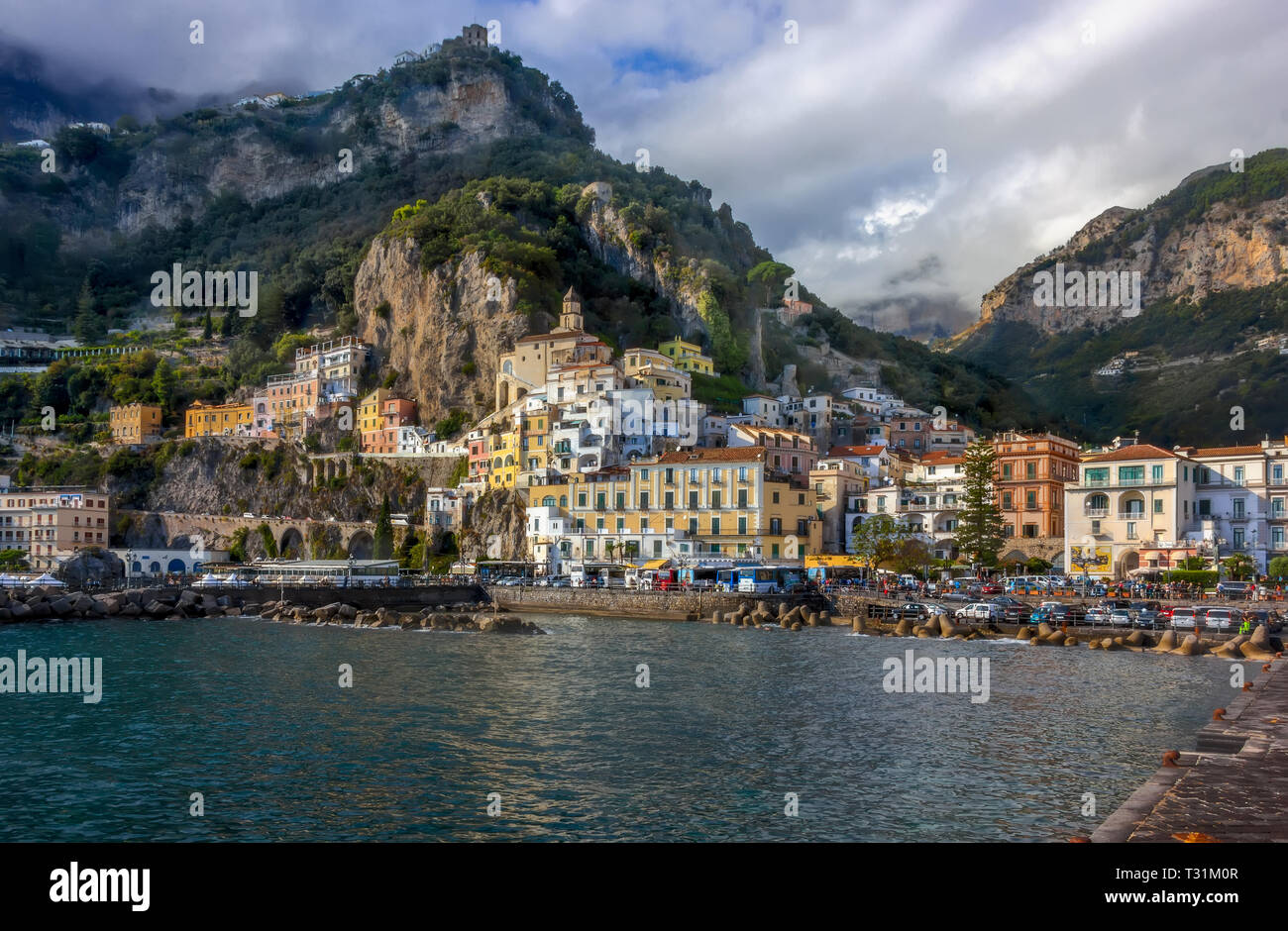 Amalfi cost in Italy. I am absolutely sure Amalfi is the most beautiful town by Naples cost. I  was there in October 2018. Yeo, colourful houses lande Stock Photo