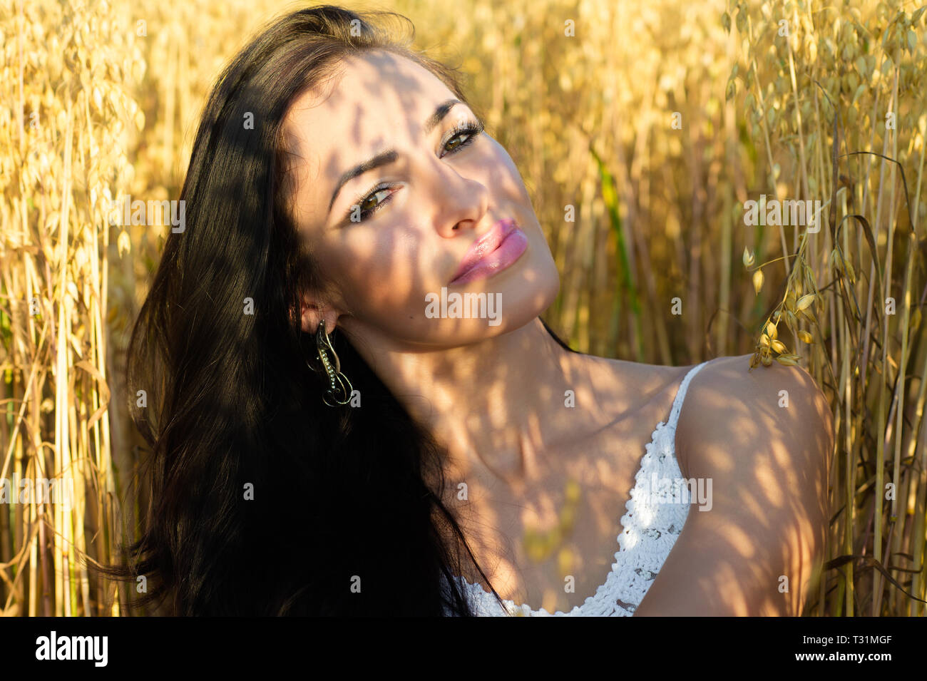 Charming young brunette woman hi-res stock photography and images - Alamy