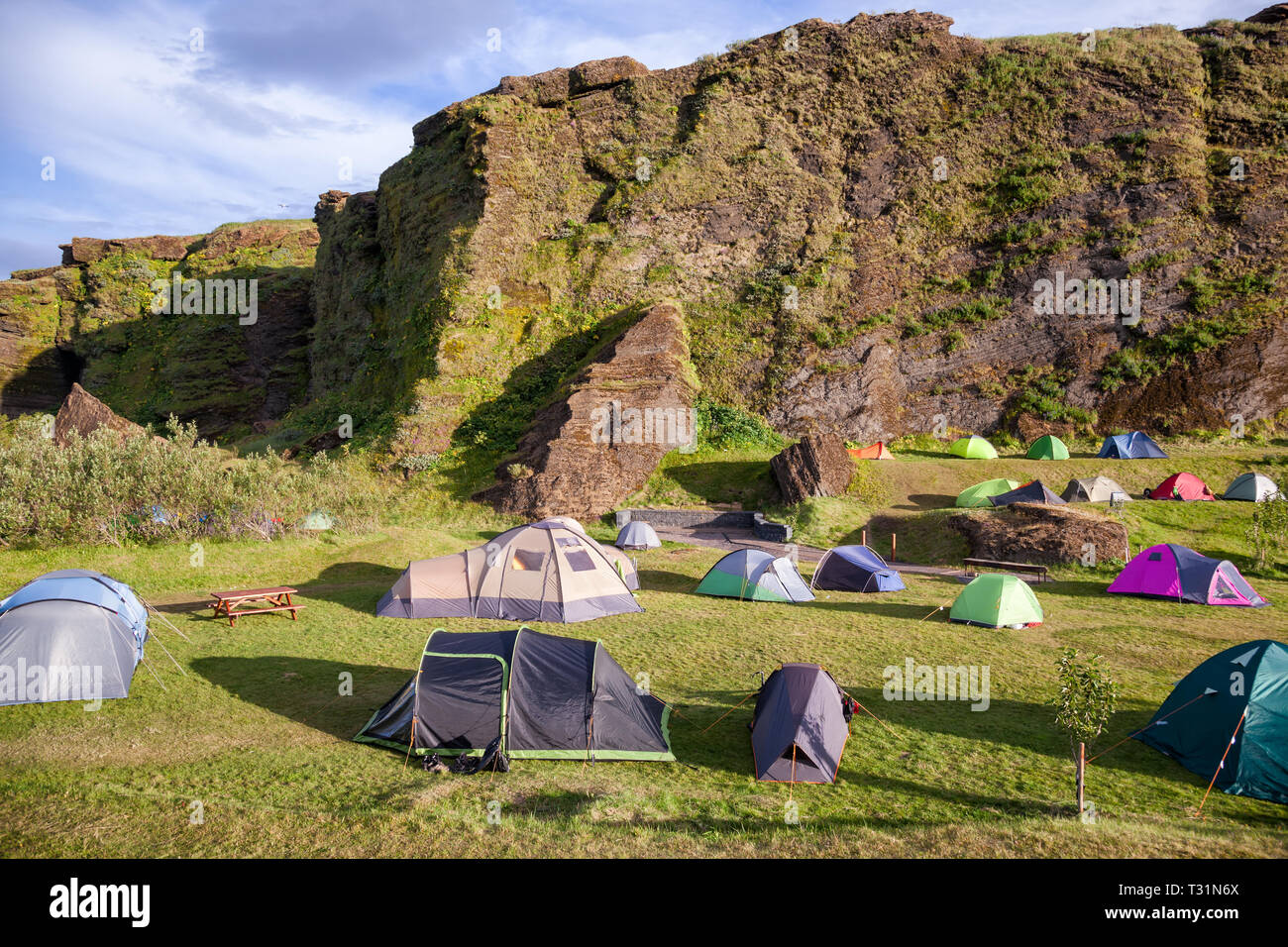 Tents at crowded Icelandic campsite at a peak of a season, VIk, Iceland