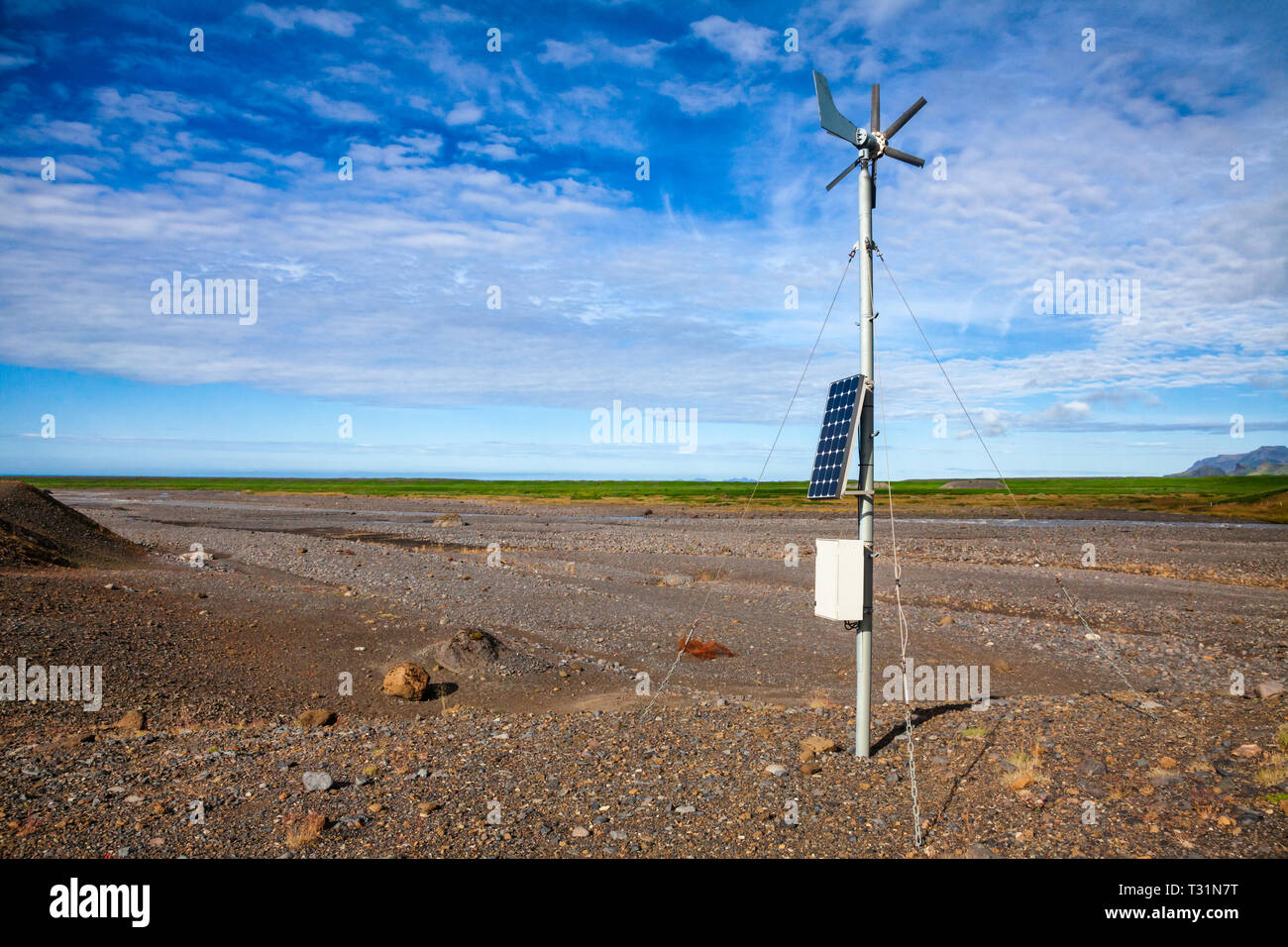 Propeller anemometer weather station with wind vane powered by solar panel in South coast of Iceland, Scandinavia Stock Photo